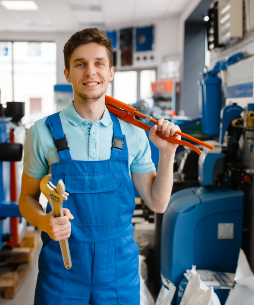 plumber holding wrench